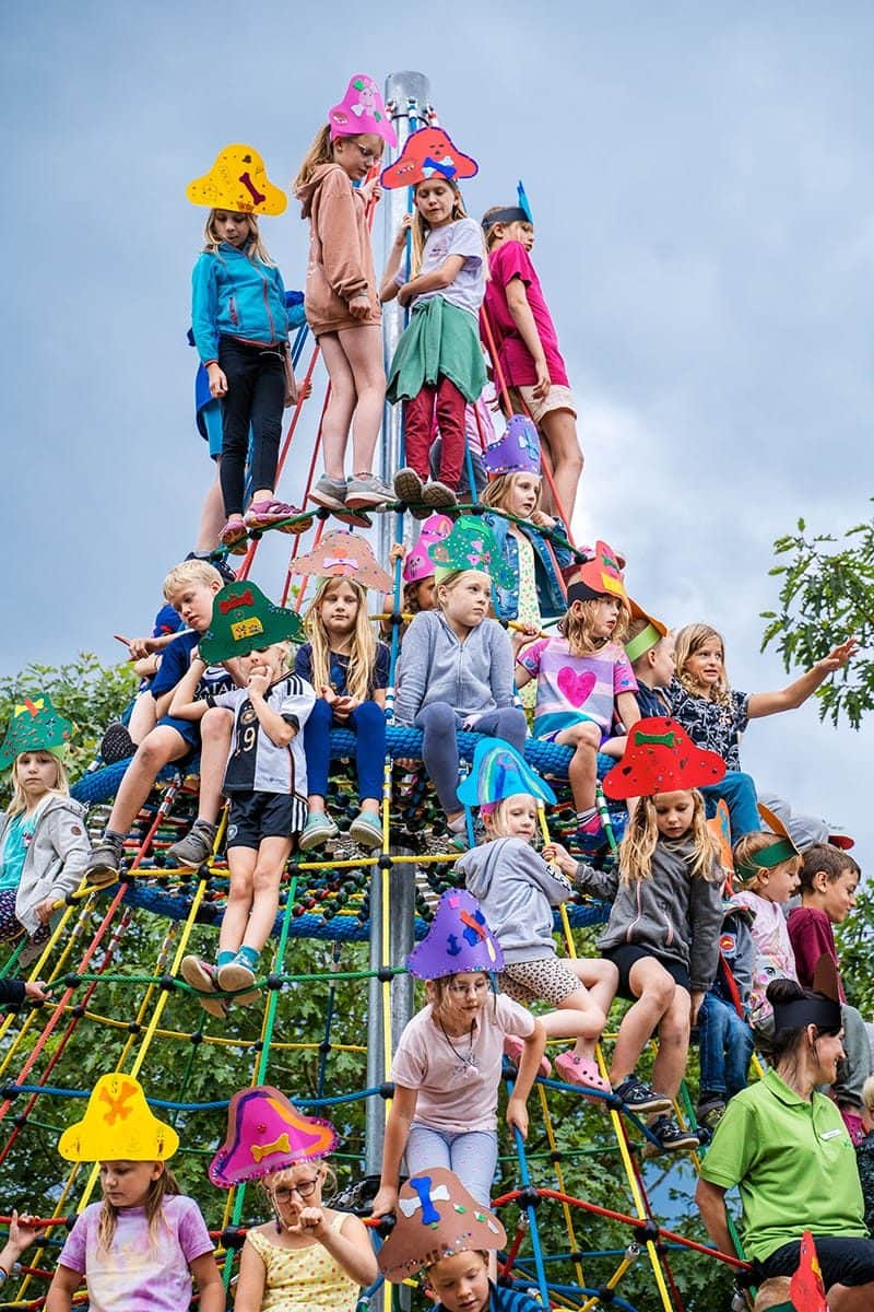 Children at the sports programme on the site
